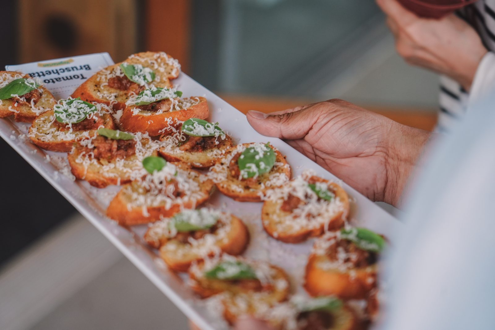A tray of tomato bruschetta going out at midday